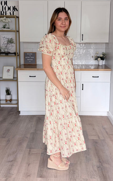 100 percent cotton maxi dress with puff sleeves and flowy silhouette