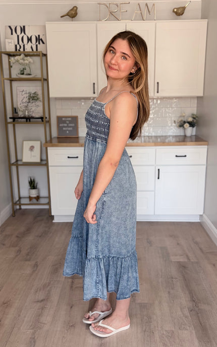 Model wearing Coastal Tencel midi dress with flowy tiered silhouette