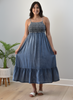 Blue washed Tencel midi dress with smocked top and tiered skirt — relaxed coastal charm from Justyna Grace Boutique.