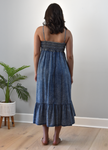 Blue washed Tencel midi dress with smocked top and tiered skirt — relaxed coastal charm from Justyna Grace Boutique.