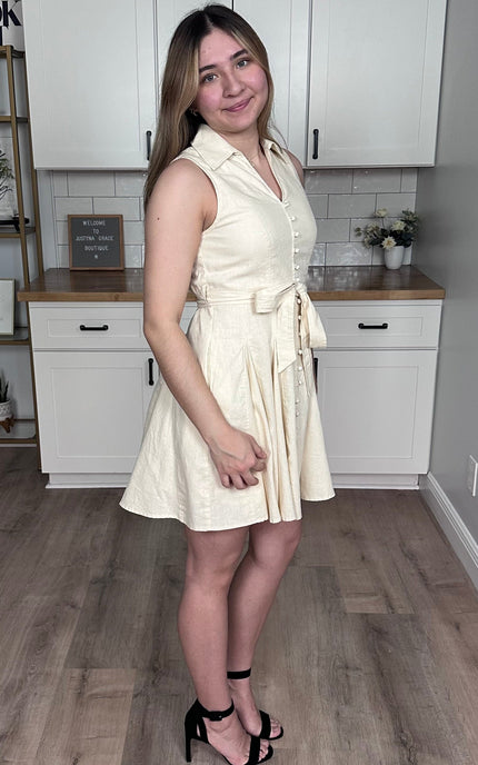 Functional button-down front on Colette linen mini dress