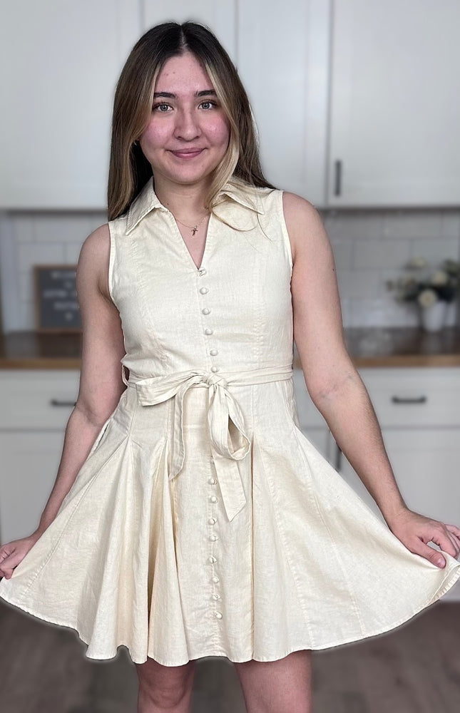 Functional button-down front on Colette linen mini dress