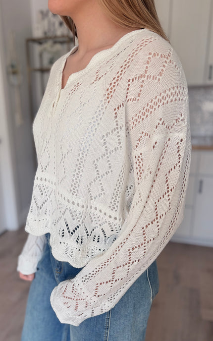 Open stitch crochet knit detail on lightweight cotton blend sweater top