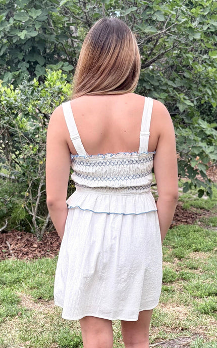 Back view of the smocked sundress showing adjustable shoulder straps and high-stretch smocked bodice for a custom fit.
