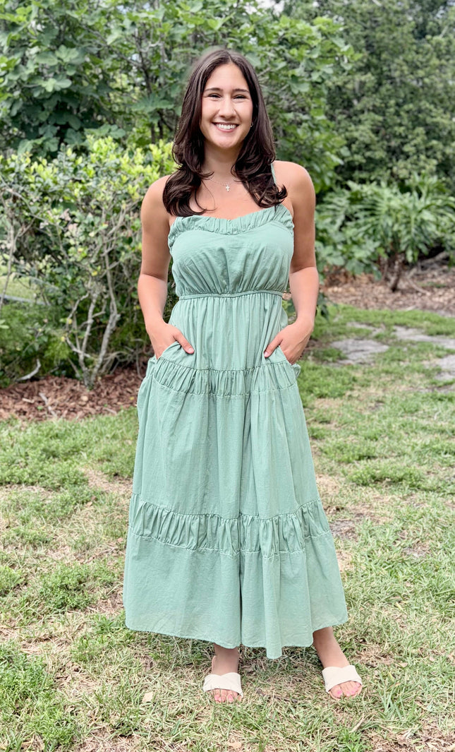 A tiered maxi skirt made of 100% breathable cotton voile, showing the airy silhouette and full-length flow.