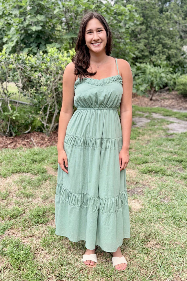 Premium cotton voile maxi dress with a tiered skirt, showcasing the elegant movement and high-quality natural fabric.