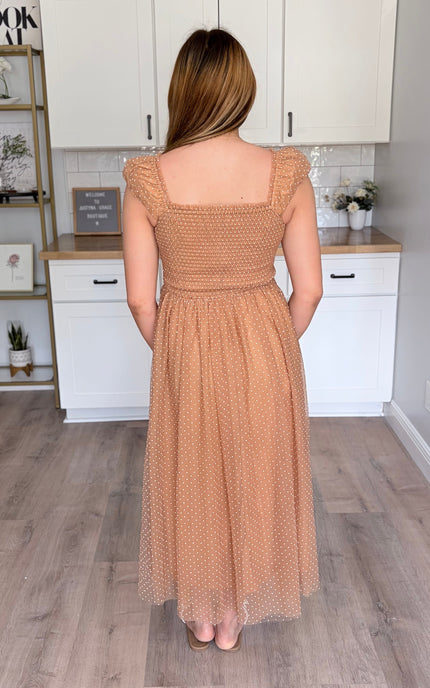 Feminine maxi gown with swiss dot mesh overlay and flowy silhouette