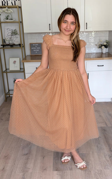 Feminine maxi gown with swiss dot mesh overlay and flowy silhouette