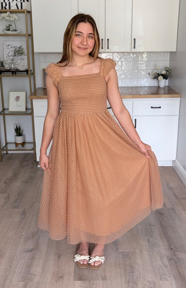 Feminine maxi gown with swiss dot mesh overlay and flowy silhouette