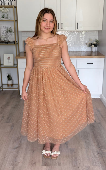 Feminine maxi gown with swiss dot mesh overlay and flowy silhouette