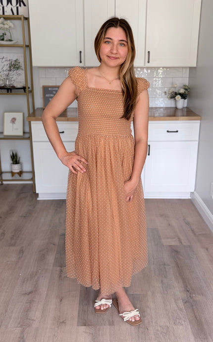 Front view of maxi gown with swiss dot mesh overlay and flowy silhouette