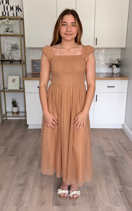Feminine maxi gown with swiss dot mesh overlay and flowy silhouette