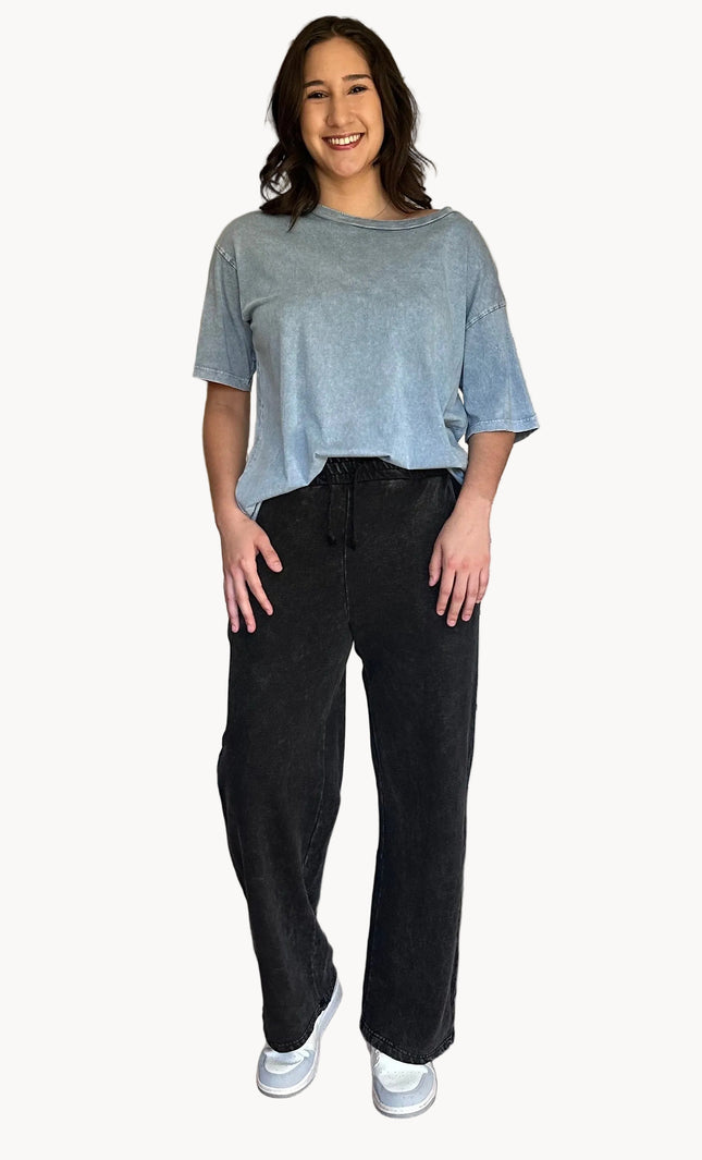Denim-wash relaxed sweatpants with soft fleece lining and adjustable drawstring waist