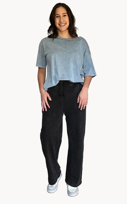 Denim-wash relaxed sweatpants with soft fleece lining and adjustable drawstring waist