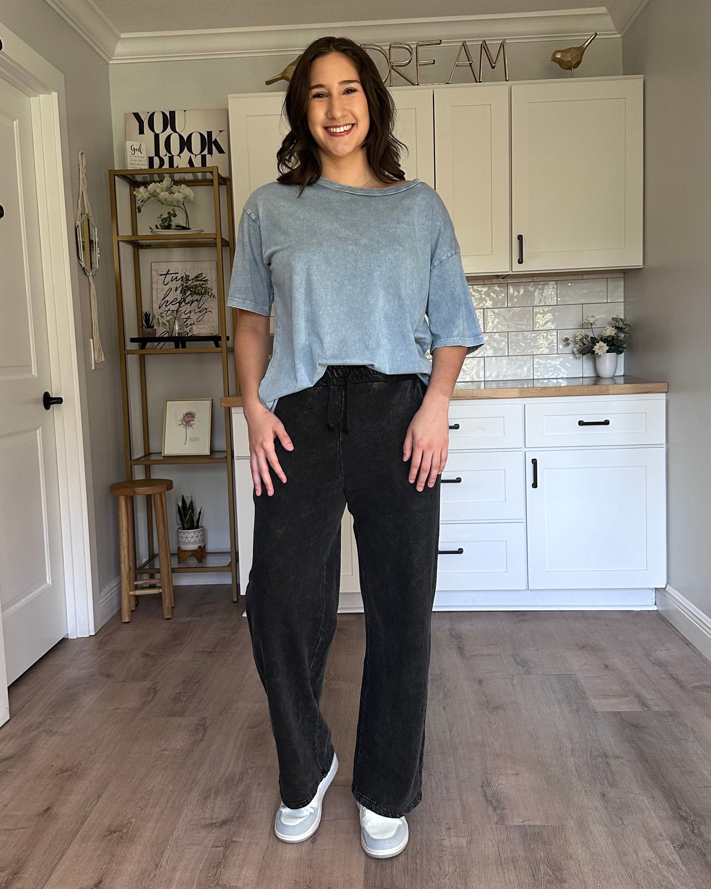 Denim-wash relaxed sweatpants with soft fleece lining and adjustable drawstring waist