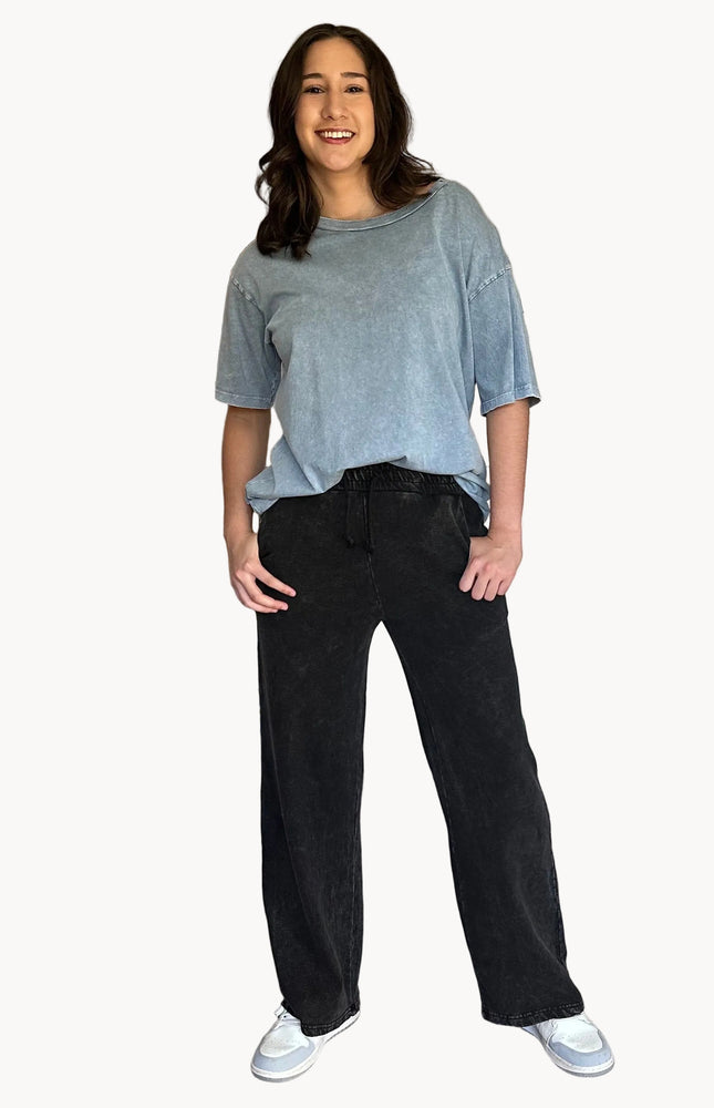 Denim-wash relaxed sweatpants with soft fleece lining and adjustable drawstring waist