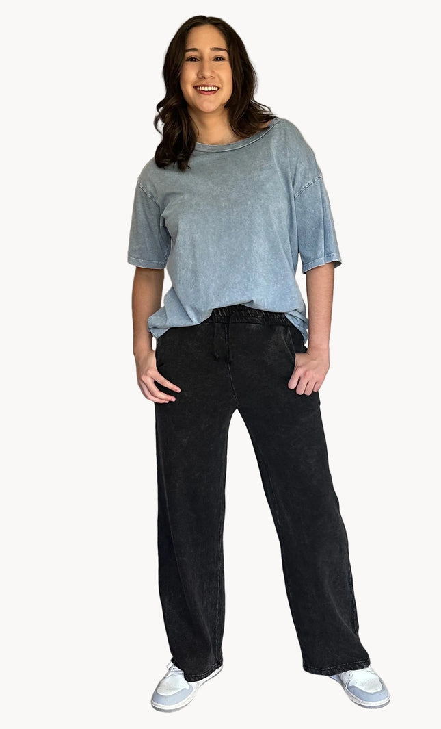 Denim-wash relaxed sweatpants with soft fleece lining and adjustable drawstring waist