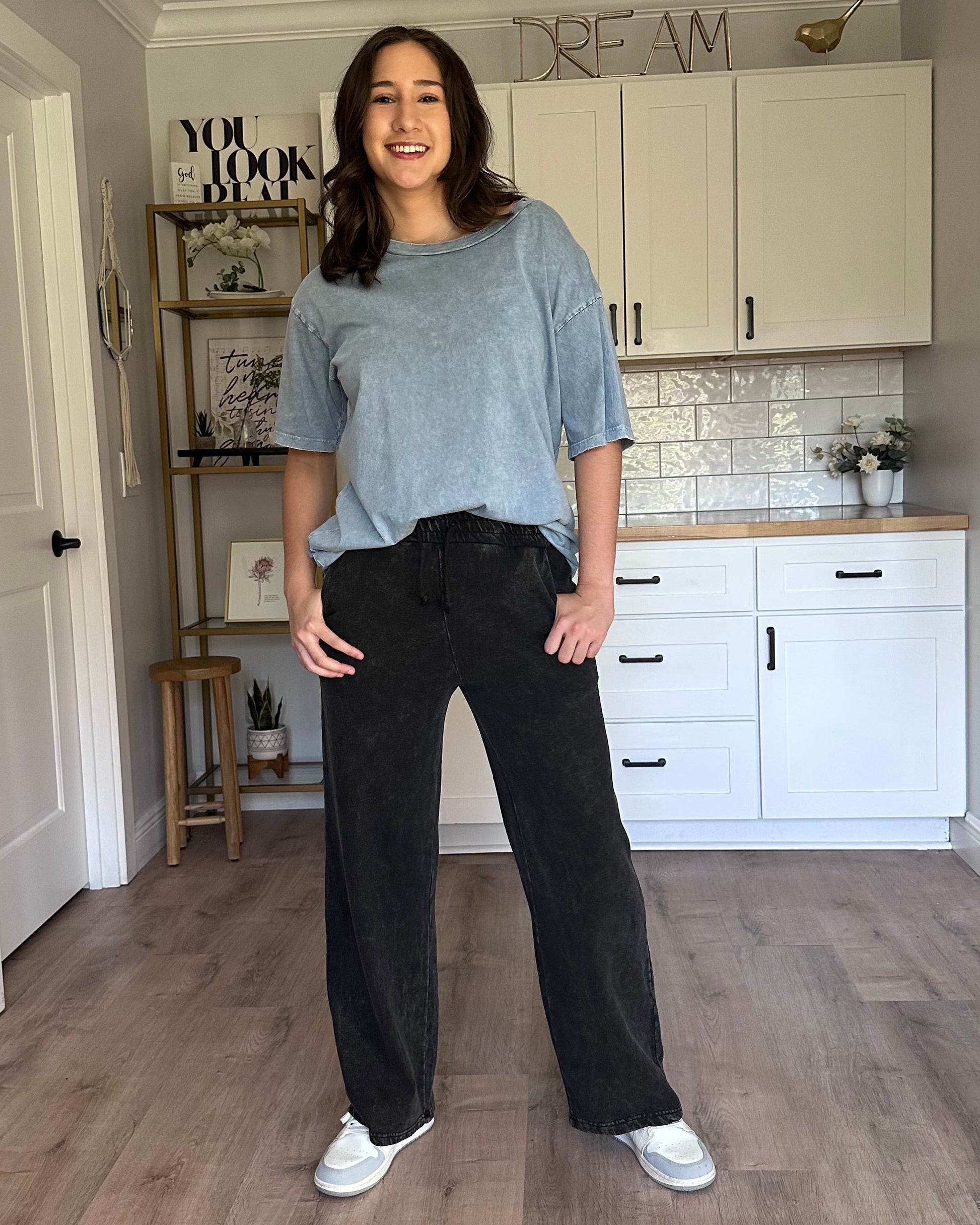 Denim-wash relaxed sweatpants with soft fleece lining and adjustable drawstring waist