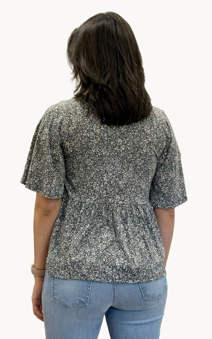 Ditsy Floral Babydoll Knit Top — soft floral print knit blouse with round neckline and ¾ sleeves from Justyna Grace Boutique.