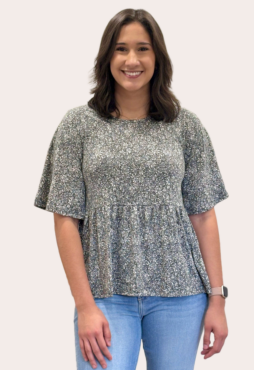 Ditsy Floral Babydoll Knit Top — soft floral print knit blouse with round neckline and ¾ sleeves from Justyna Grace Boutique.