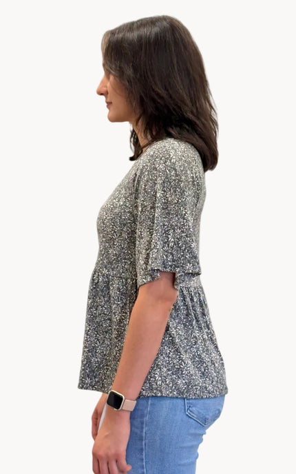 Ditsy Floral Babydoll Knit Top — soft floral print knit blouse with round neckline and ¾ sleeves from Justyna Grace Boutique.