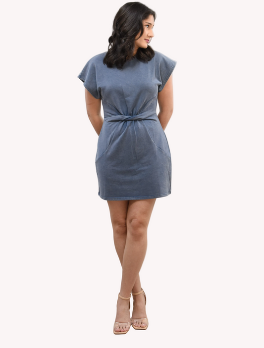 Woman wearing a blue dress on a white background