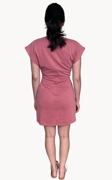 Mineral-washed French terry mini dress in a relaxed silhouette with drop shoulders, round neckline, and subtle waist twist detail for shape.