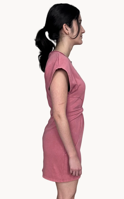 Laid-back French terry mini dress with mineral wash finish, relaxed drop shoulders, round neckline, and waist twist detail for a flattering fit.
