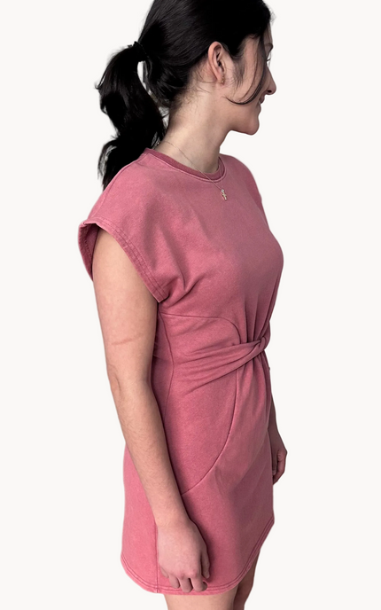 Mineral-washed French terry mini dress in a relaxed silhouette with drop shoulders, round neckline, and subtle waist twist detail for shape.