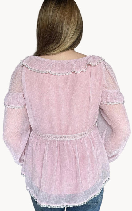 Back view of the Eleanor peasant blouse with relaxed fit and lightweight chiffon fabric