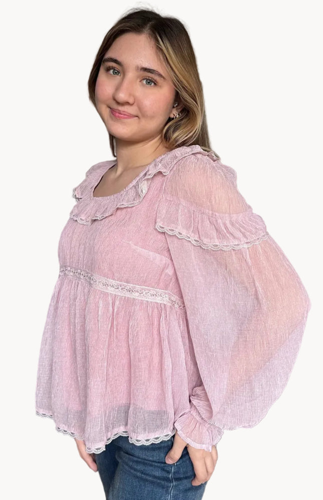 Side view of the Eleanor peasant blouse with relaxed fit and lightweight chiffon fabric