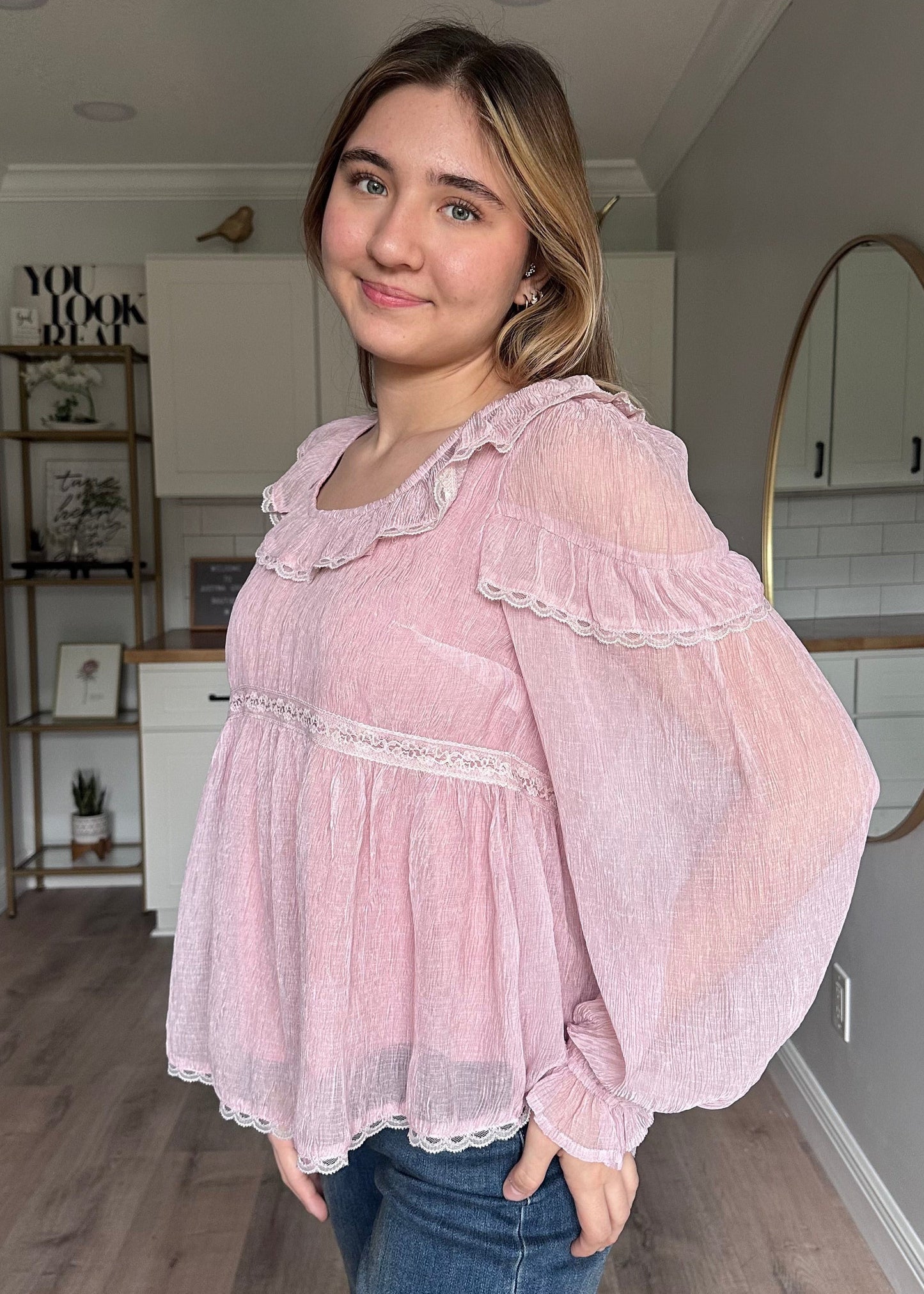 Side view of the Eleanor peasant blouse with relaxed fit and lightweight chiffon fabric
