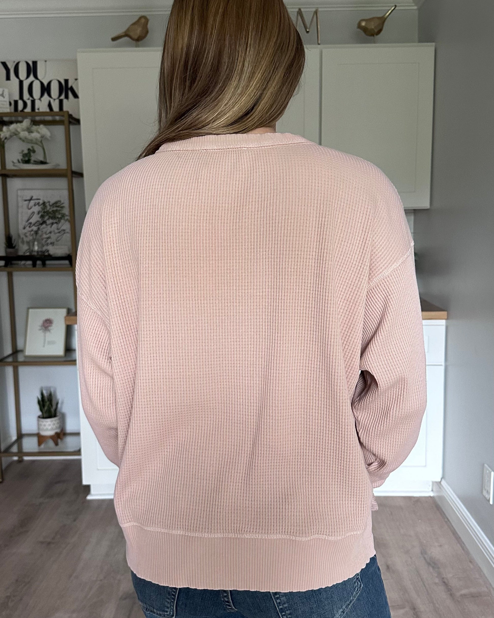 Back view of the Eliza drop shoulder knit top with a casual, lived-in silhouette