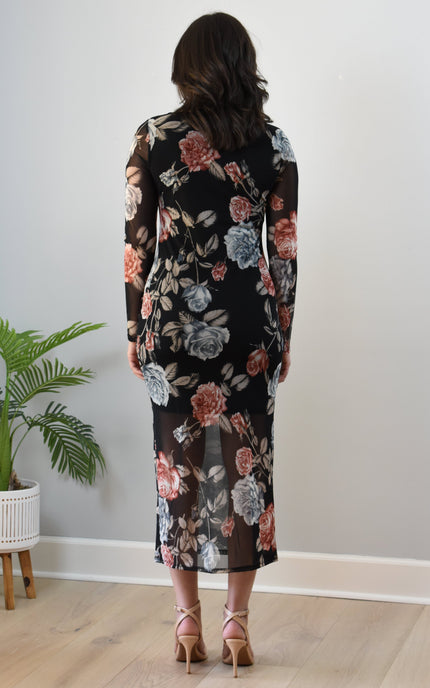 Evening Poise Dress — elegant floral print midi with sleek silhouette and back slit from Justyna Grace Boutique.
