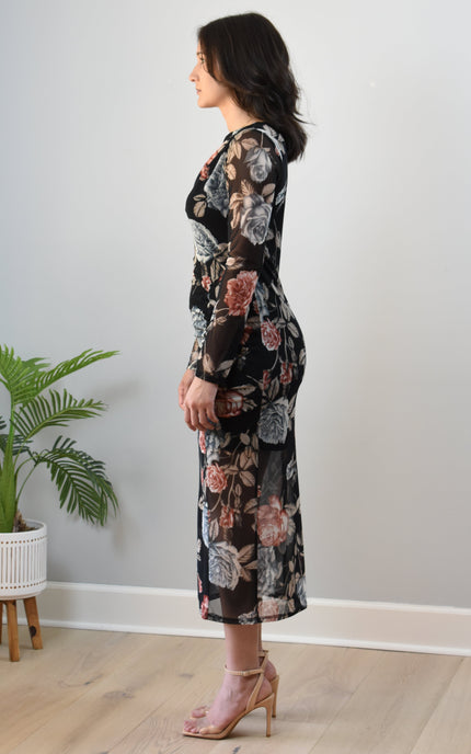 Evening Poise Dress — elegant floral print midi with sleek silhouette and back slit from Justyna Grace Boutique.