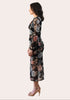 Evening Poise Dress — elegant floral print midi with sleek silhouette and back slit from Justyna Grace Boutique.