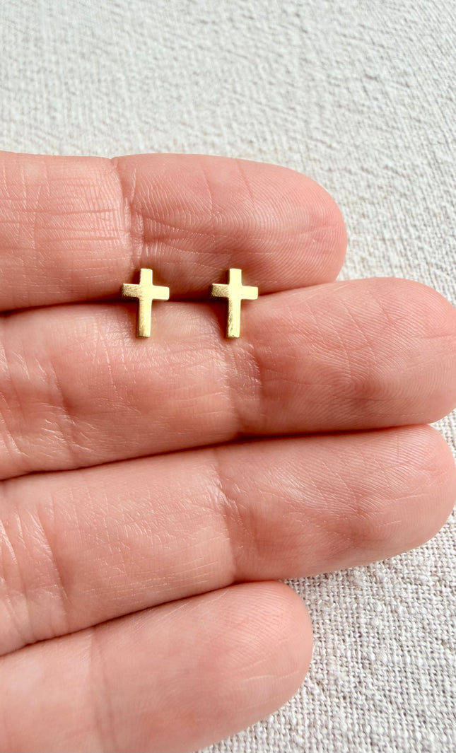 Close-up of Faith Cross Stud Earring front showing minimal cross design in 18k gold PVD over stainless steel