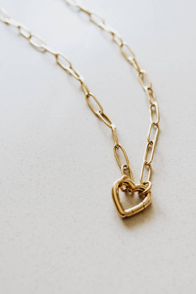 Faithful Heart Pendant — 18K gold-plated waterproof necklace with openable heart charm ethically made by survivors from Justyna Grace Boutique. 