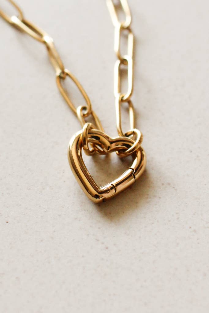 Faithful Heart Pendant — 18K gold-plated waterproof necklace with openable heart charm ethically made by survivors from Justyna Grace Boutique.