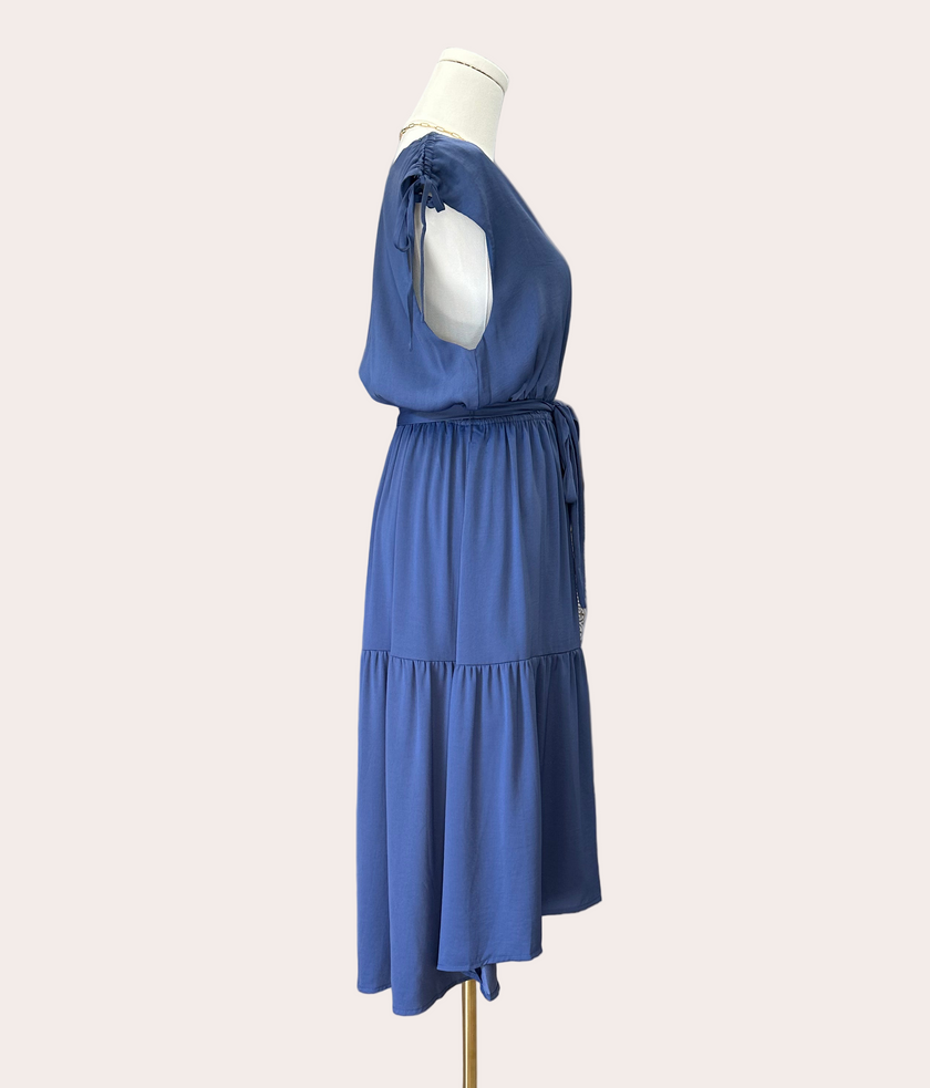 Falling Grace Midi Dress – soft dusty blue tiered midi with tie sleeves and gathered waist – Justyna Grace Boutique