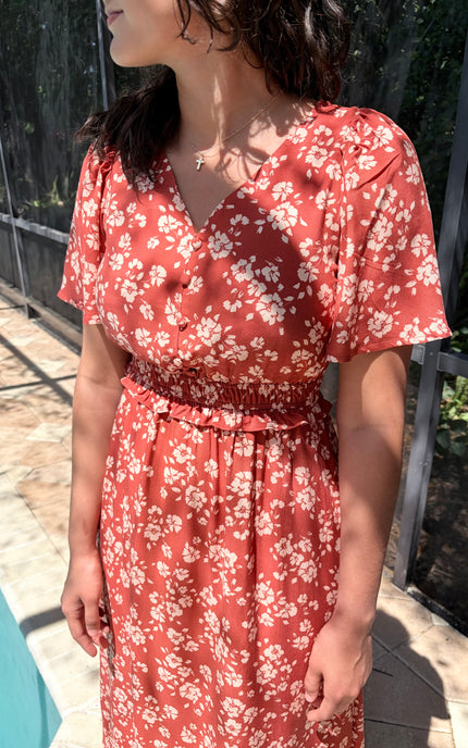 Feminine floral midi dress styled for everyday wear