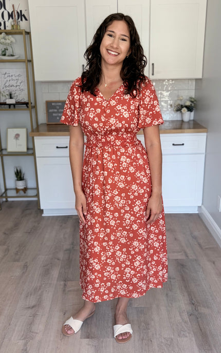 Floral midi dress with ruffle waist and V-neckline front view