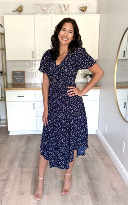 Side view of floral midi dress with flattering shape
