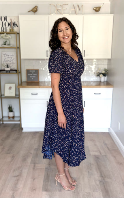 Side view of floral midi dress with flattering shape