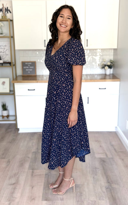 Side view of floral midi dress with flattering shape