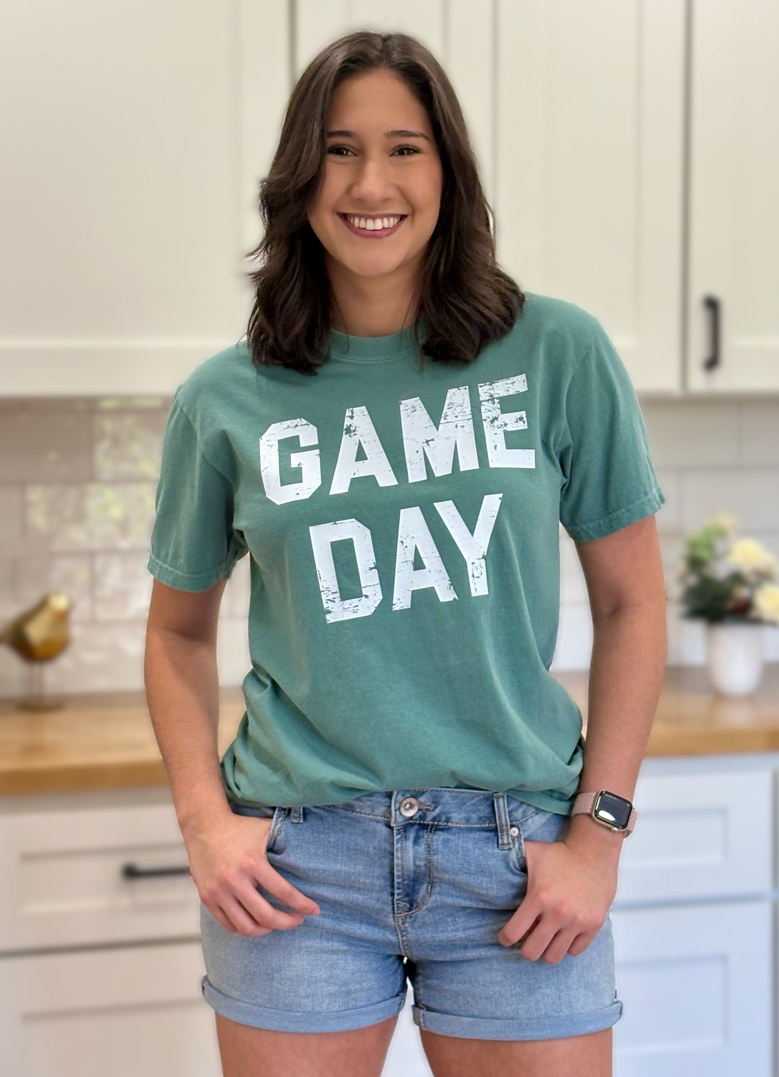 Vintage-style “Game Day Sports” graphic tee in soft garment-dyed cotton with relaxed unisex fit.
