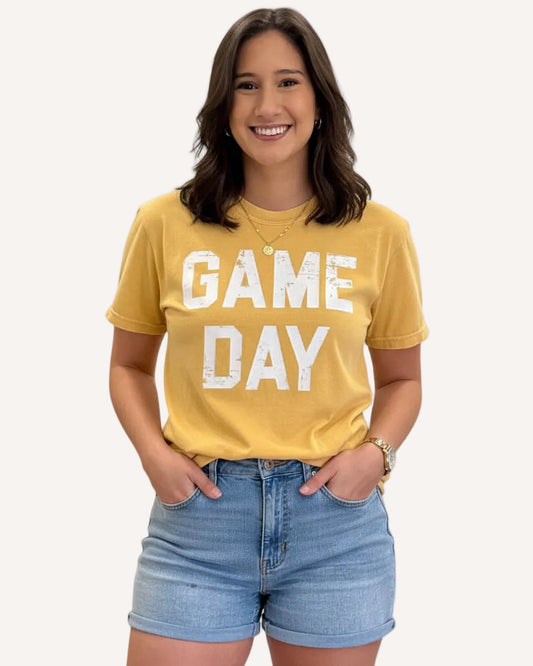 Vintage-style “Game Day Sports” graphic tee in soft garment-dyed cotton with relaxed unisex fit.