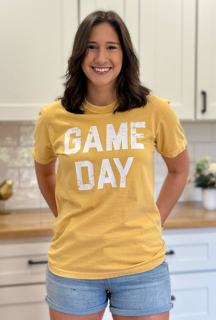Vintage-style “Game Day Sports” graphic tee in soft garment-dyed cotton with relaxed unisex fit.