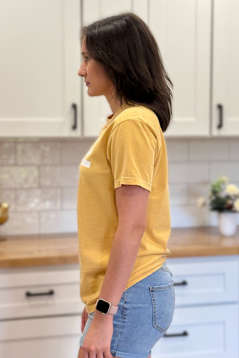 Vintage-style “Game Day Sports” graphic tee in soft garment-dyed cotton with relaxed unisex fit.