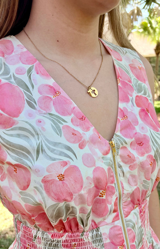 Close-up of V-neckline on Garden Floral Cotton Midi Dress showing sleeveless bodice and flattering neckline shape